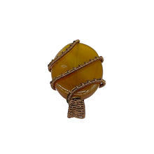 Load image into Gallery viewer, Top View - Yellow Onyx Pendant Wrapped in Antique Bronze
