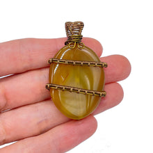 Load image into Gallery viewer, Yellow Onyx Pendant Wrapped in Antique Bronze
